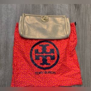 Beautiful gold Tory clutch bag